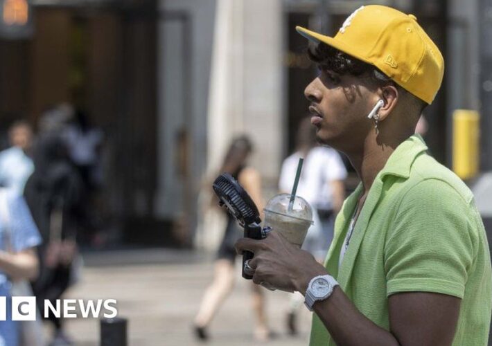 UK heatwave: Temperature tops 38C and likely to rise on Tuesday