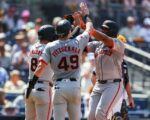 Giants slug four homers to edge Padres