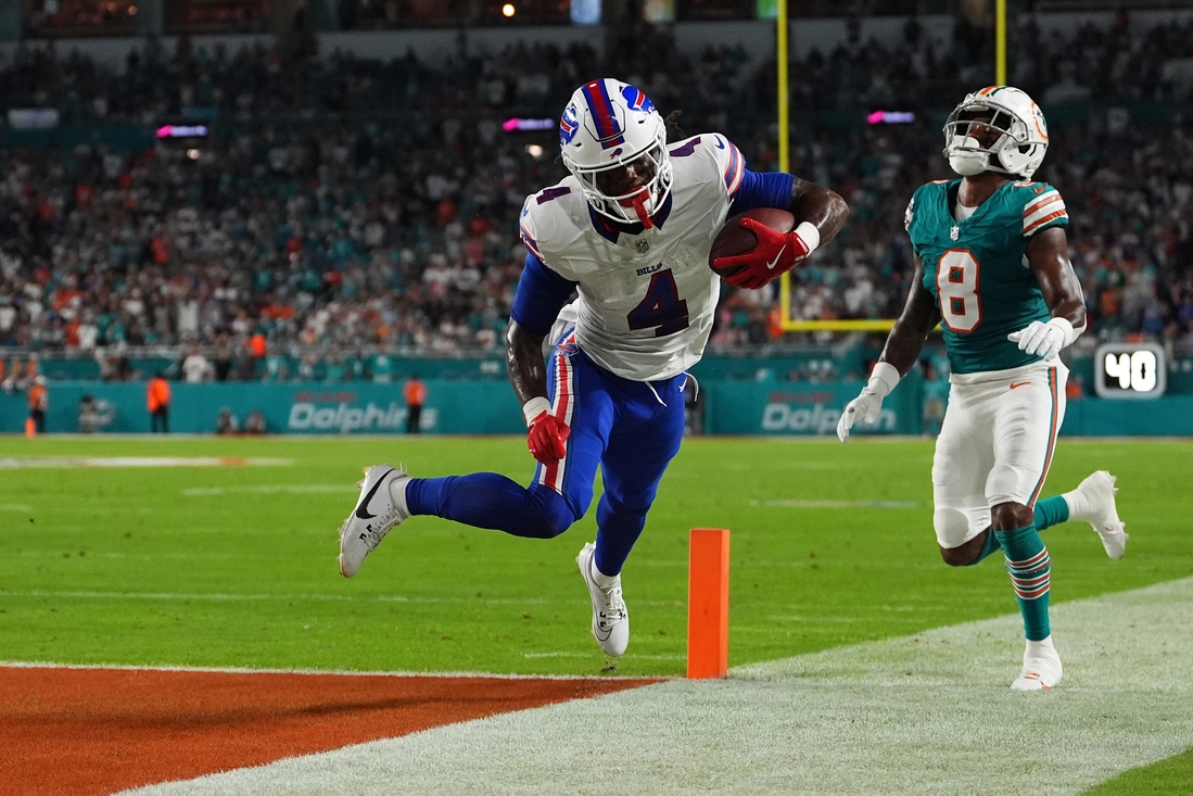 James Cook scores 3 TDs as Bills blow out Dolphins