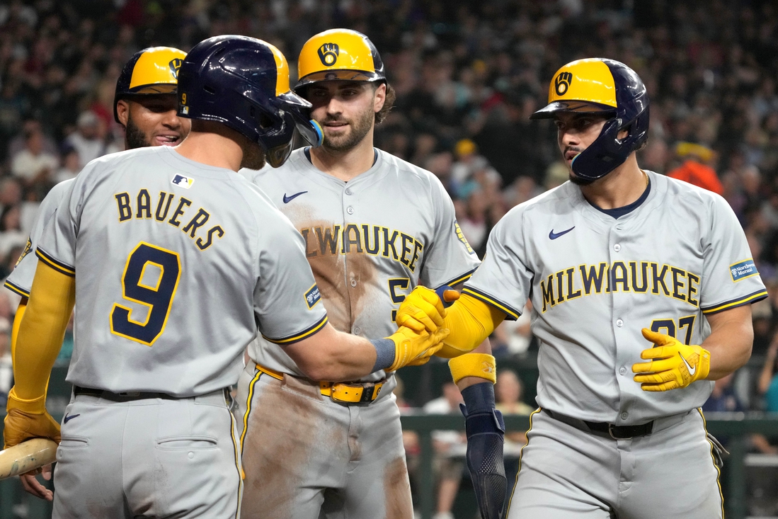 Brewers near division title while Arizona seeks to stop slide