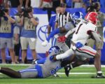 Top 25 roundup: No. 1 Georgia avoids upset, nips Kentucky 13-12