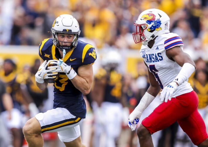 West Virginia comes from behind late to beat Kansas