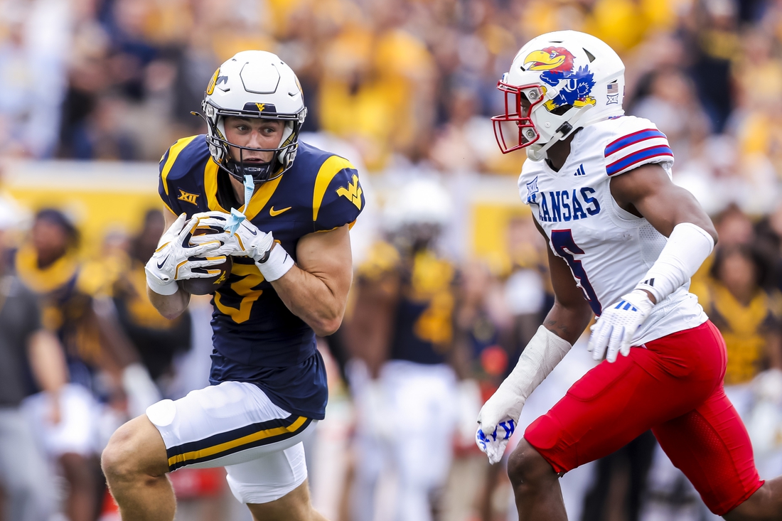 West Virginia comes from behind late to beat Kansas