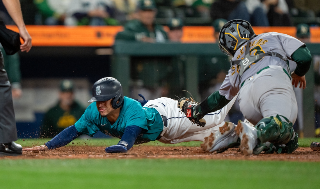 Mariners tie it in 9th, walk off on A’s in 10th