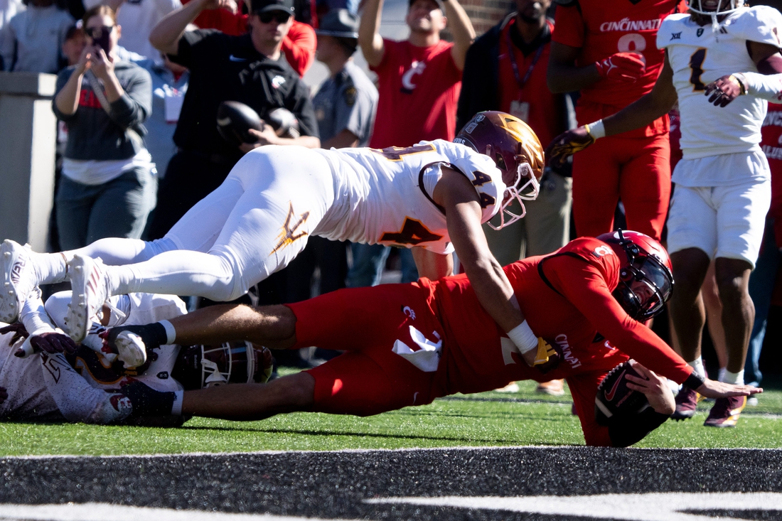 First-half scoring burst carries Cincinnati past Arizona State