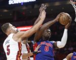 Heat turn away Pistons for first home win