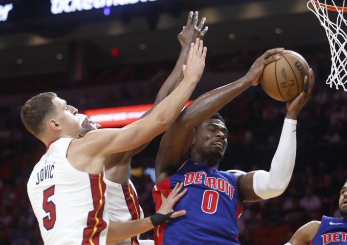 Heat turn away Pistons for first home win