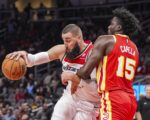 Wizards edge Hawks to notch first win of season