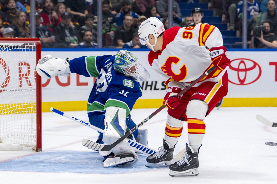 Elias Pettersson goes for 2 points again as Canucks best Flames