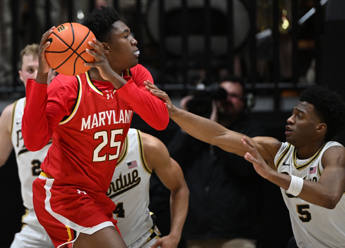 Derik Queen guides Maryland against St. Francis (Pa.)