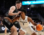 No. 22 Cincinnati roars back late to upend rival Xavier