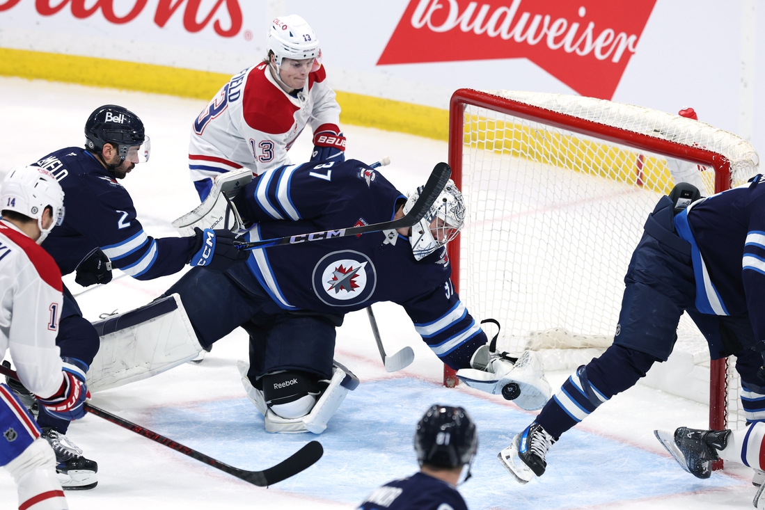 Jets regain first place in the Central with 4-2 win over Canadiens