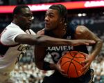 No. 11 UConn holds off feisty Xavier in Big East opener