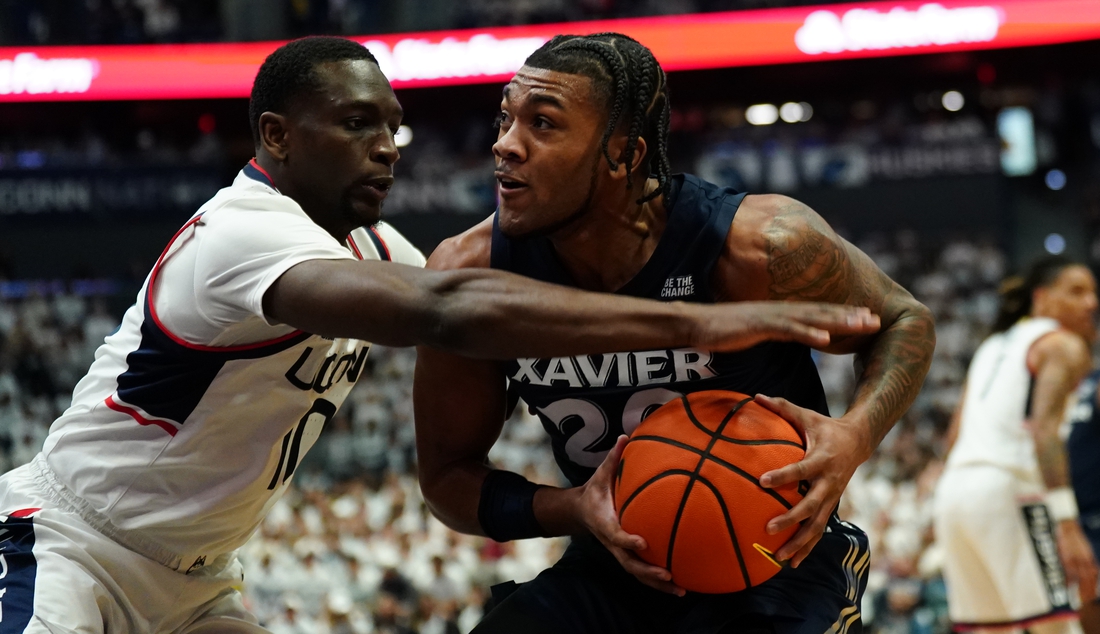 No. 11 UConn holds off feisty Xavier in Big East opener