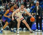 No. 25 UConn erupts late, holds off DePaul