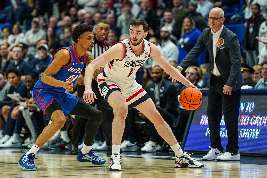 No. 25 UConn erupts late, holds off DePaul